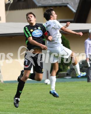 Fussball Kaerntner Liga. ATUS Ferlach gegen Rapid Lienz. Ernst Golautschnig (Ferlach), Manuel Eder (Lienz). Ferlach, am 29.9.2012.
Foto:Kuess
---
pressefotos, pressefotografie, kuess, qs, qspictures, sport, bild, bilder, bilddatenbank