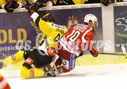 EBEL. Eishockey Bundesliga. EC KAC gegen UPC Vienna Capitals.  Tyler Scofield,  (KAC), Jamie Fraser (Caps). Klagenfurt, am 30.9.2012.
Foto: Kuess 


---
pressefotos, pressefotografie, kuess, qs, qspictures, sport, bild, bilder, bilddatenbank