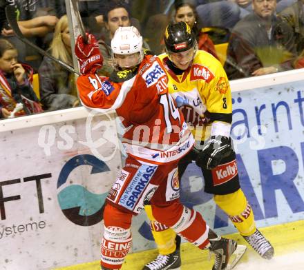 EBEL. Eishockey Bundesliga. EC KAC gegen UPC Vienna Capitals. Johannes Reichel,  (KAC), Tony Romano  (Caps). Klagenfurt, am 30.9.2012.
Foto: Kuess 


---
pressefotos, pressefotografie, kuess, qs, qspictures, sport, bild, bilder, bilddatenbank