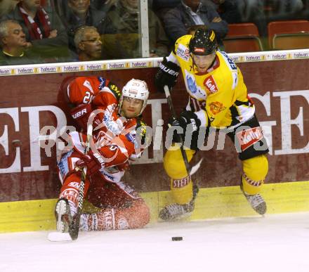 EBEL. Eishockey Bundesliga. EC KAC gegen UPC Vienna Capitals.  John Lammers, (KAC), Adrian Veideman  (Caps). Klagenfurt, am 30.9.2012.
Foto: Kuess 


---
pressefotos, pressefotografie, kuess, qs, qspictures, sport, bild, bilder, bilddatenbank