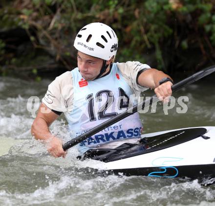 Wildwassersport. Alpe Adria Kanu Slalom Gurk 2012.  Dominik Scherwitzl (KC Glanegg). Klagenfurt, Gurkerbruecke, am 30.9.2012.
Foto: Kuess
---
pressefotos, pressefotografie, kuess, qs, qspictures, sport, bild, bilder, bilddatenbank