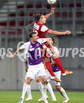 Fussball OEFB Cup. SK Austria Klagenfurt gegen FC Admira Wacker Moedling. Stefan Erkinger,  (Austria), Stephan Auer (Admira). Klagenfurt, am 25.9.2012.
Foto: Kuess
---
pressefotos, pressefotografie, kuess, qs, qspictures, sport, bild, bilder, bilddatenbank