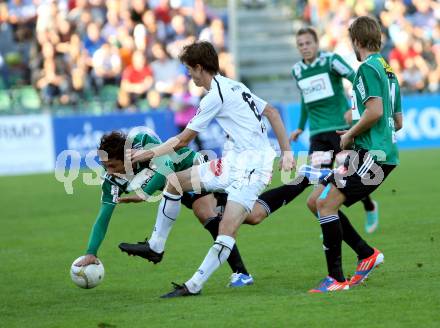 Fussball. Bundesliga. RZ Pellets WAC gegen SV Josko Ried. Christian Falk,  (WAC), Clemens Walch (Ried). Wolfsberg, 6.10.2012.
Foto: Kuess

---
pressefotos, pressefotografie, kuess, qs, qspictures, sport, bild, bilder, bilddatenbank