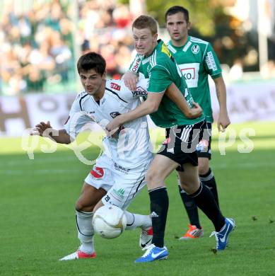 Fussball. Bundesliga. RZ Pellets WAC gegen SV Josko Ried. Mihret Topcagic,  (WAC), Thomas Reifeltshammer (Ried). Wolfsberg, 6.10.2012.
Foto: Kuess

---
pressefotos, pressefotografie, kuess, qs, qspictures, sport, bild, bilder, bilddatenbank