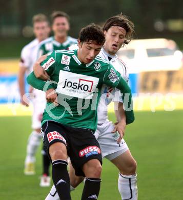 Fussball. Bundesliga. RZ Pellets WAC gegen SV Josko Ried. Dario Baldauf, (WAC), Robert Zulj  (Ried). Wolfsberg, 6.10.2012.
Foto: Kuess

---
pressefotos, pressefotografie, kuess, qs, qspictures, sport, bild, bilder, bilddatenbank