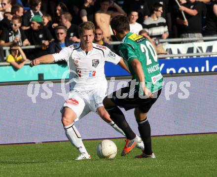 Fussball. Bundesliga. RZ Pellets WAC gegen SV Josko Ried. Christian Thonhofer,  (WAC), Anel Hadzic (Ried). Wolfsberg, 6.10.2012.
Foto: Kuess

---
pressefotos, pressefotografie, kuess, qs, qspictures, sport, bild, bilder, bilddatenbank