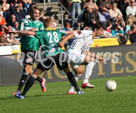 Fussball. Bundesliga. RZ Pellets WAC gegen SV Josko Ried. Mihret Topcagic,  (WAC), Thomas Reifeltshammer (Ried). Wolfsberg, 6.10.2012.
Foto: Kuess

---
pressefotos, pressefotografie, kuess, qs, qspictures, sport, bild, bilder, bilddatenbank