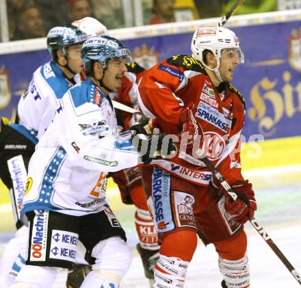 EBEL. Eishockey Bundesliga. EC KAC gegen EHC LIWEST Linz. Tyler Spurgeon,  (KAC),  Franklin McDonald (Linz). Klagenfurt, am 7.10.2012.
Foto: Kuess 


---
pressefotos, pressefotografie, kuess, qs, qspictures, sport, bild, bilder, bilddatenbank