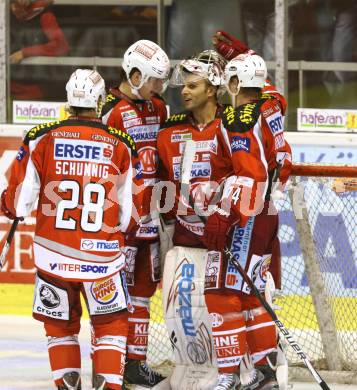 EBEL. Eishockey Bundesliga. EC KAC gegen EHC LIWEST Linz.  Torjubel Andy Chiodo, Thomas Hundertpfund, Martin Schumnig, Jamie Lundmark (KAC). Klagenfurt, am 7.10.2012.
Foto: Kuess 


---
pressefotos, pressefotografie, kuess, qs, qspictures, sport, bild, bilder, bilddatenbank