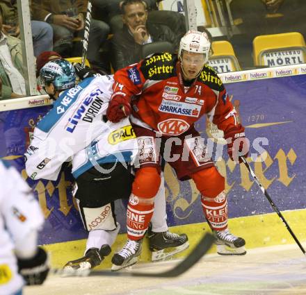 EBEL. Eishockey Bundesliga. EC KAC gegen EHC LIWEST Linz.  Jamie Lundmark,  (KAC), Marc-Andre Dorion (Linz). Klagenfurt, am 7.10.2012.
Foto: Kuess 


---
pressefotos, pressefotografie, kuess, qs, qspictures, sport, bild, bilder, bilddatenbank