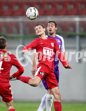 Fussball SK Austria Klagenfurt gegen St. Florian. Marc Sand, (Klagenfurt), Dominic Winkler  (St. Florian), Klagenfurt, 13.10.2012.
Foto: Kuess
---
pressefotos, pressefotografie, kuess, qs, qspictures, sport, bild, bilder, bilddatenbank