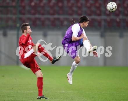 Fussball SK Austria Klagenfurt gegen St. Florian. Siegfried Rasswalder,(Klagenfurt),  Lukas Wurmlinger  (St. Florian), Klagenfurt, 13.10.2012.
Foto: Kuess
---
pressefotos, pressefotografie, kuess, qs, qspictures, sport, bild, bilder, bilddatenbank