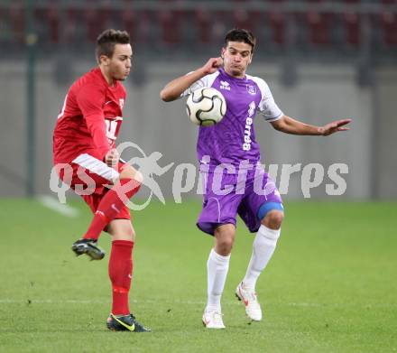 Fussball SK Austria Klagenfurt gegen St. Florian. Siegfried Rasswalder,(Klagenfurt),  Lukas Wurmlinger  (St. Florian), Klagenfurt, 13.10.2012.
Foto: Kuess
---
pressefotos, pressefotografie, kuess, qs, qspictures, sport, bild, bilder, bilddatenbank