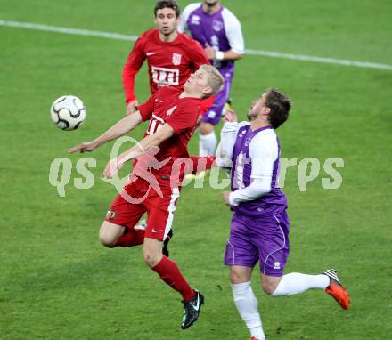 Fussball SK Austria Klagenfurt gegen St. Florian. Grega Triplat (Klagenfurt), Ortner Michael (St. Florian), Klagenfurt, 13.10.2012.
Foto: Kuess
---
pressefotos, pressefotografie, kuess, qs, qspictures, sport, bild, bilder, bilddatenbank