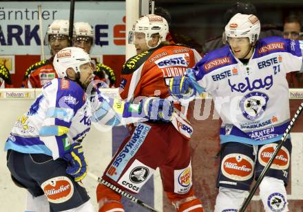 EBEL. Eishockey Bundesliga. EC KAC gegen VSV.  Jamie Lundmark,  (KAC),  Markus Peintner, Benjamin Petrik (VSV). Klagenfurt, am 14.10.2012.
Foto: Kuess 


---
pressefotos, pressefotografie, kuess, qs, qspictures, sport, bild, bilder, bilddatenbank