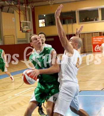 Basketball. 2. Bundesliga. Woerthersee Piraten gegen KOS Klagenfurt Celovec. Joachim Buggelsheim, (Piraten), Zan Jenko  (KOS). Klagenfurt, am 20.10.2012.
Foto: Kuess
---
pressefotos, pressefotografie, kuess, qs, qspictures, sport, bild, bilder, bilddatenbank