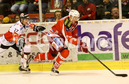 EBEL. Eishockey Bundesliga. EC KAC gegen HC TWK Innsbruck "Die Haie".   Tyler Myers, (KAC), Andreas Hanschitz (Innsbruck). Klagenfurt, am 21.10.2012.
Foto: Kuess 


---
pressefotos, pressefotografie, kuess, qs, qspictures, sport, bild, bilder, bilddatenbank