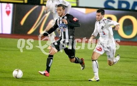 Fussball. Bundesliga. RZ Pellets WAC gegen SK Puntigamer Sturm Graz.  Roland Putsche,  (WAC), Haris Bukva (Graz). Wolfsberg, 27.10.2012.
Foto: Kuess

---
pressefotos, pressefotografie, kuess, qs, qspictures, sport, bild, bilder, bilddatenbank