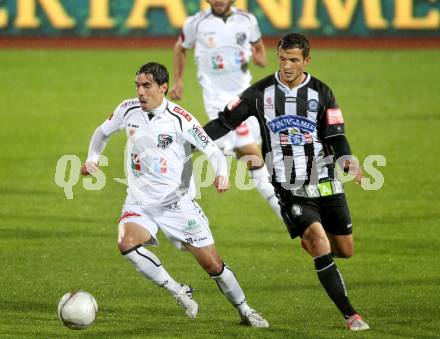 Fussball. Bundesliga. RZ Pellets WAC gegen SK Puntigamer Sturm Graz.  David De Paula, (WAC), Haris Bukva  (Graz). Wolfsberg, 27.10.2012.
Foto: Kuess

---
pressefotos, pressefotografie, kuess, qs, qspictures, sport, bild, bilder, bilddatenbank