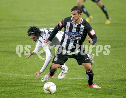 Fussball. Bundesliga. RZ Pellets WAC gegen SK Puntigamer Sturm Graz.  Jacobo,  (WAC), Haris Bukva (Graz). Wolfsberg, 27.10.2012.
Foto: Kuess

---
pressefotos, pressefotografie, kuess, qs, qspictures, sport, bild, bilder, bilddatenbank