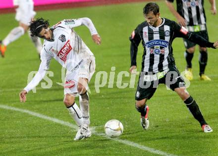 Fussball. Bundesliga. RZ Pellets WAC gegen SK Puntigamer Sturm Graz.  Jacobo,  (WAC), Haris Bukva (Graz). Wolfsberg, 27.10.2012.
Foto: Kuess

---
pressefotos, pressefotografie, kuess, qs, qspictures, sport, bild, bilder, bilddatenbank