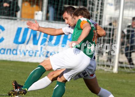 Fussball Regionalliga. SAK gegen Wallern. Murat Veliu,  (SAK), Herwig Drechsel (Wallern). Klagenfurt, 3.11.2012.
Foto: Kuess
---
pressefotos, pressefotografie, kuess, qs, qspictures, sport, bild, bilder, bilddatenbank