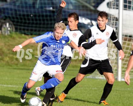 Fussball Kaerntner Liga. Maria Saal gegen Treibach. Lucian Florin Orga,  (Maria Saal),Alexander Lessnigg (Treibach). Maria Saal, 3.11.2012.
Foto: kuess
---
pressefotos, pressefotografie, kuess, qs, qspictures, sport, bild, bilder, bilddatenbank