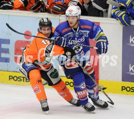 EBEL. Eishockey Bundesliga. EC VSV gegen Moser Medical Graz 99ers.  John Hughes,  (VSV), Robert Lembacher (Graz). Villach, am 14.11.2012.
Foto: Kuess 


---
pressefotos, pressefotografie, kuess, qs, qspictures, sport, bild, bilder, bilddatenbank