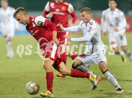 Fussball. Bundesliga. RZ Pellets WAC gegen FC Admira Wacker Moedling.  Manuel Kerhe,  (WAC), Andreas Schrott (Moedling). Wolfsberg, 17.11.2012.
Foto: Kuess

---
pressefotos, pressefotografie, kuess, qs, qspictures, sport, bild, bilder, bilddatenbank