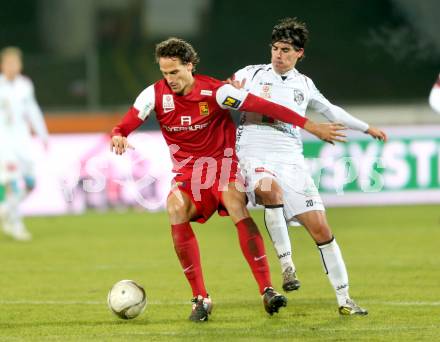 Fussball. Bundesliga. RZ Pellets WAC gegen FC Admira Wacker Moedling.  David De Paula, (WAC), Peter Poellhuber  (Moedling). Wolfsberg, 17.11.2012.
Foto: Kuess

---
pressefotos, pressefotografie, kuess, qs, qspictures, sport, bild, bilder, bilddatenbank