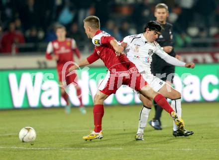 Fussball. Bundesliga. RZ Pellets WAC gegen FC Admira Wacker Moedling.  David De Paula,  (WAC), Andreas Schrott (Moedling). Wolfsberg, 17.11.2012.
Foto: Kuess

---
pressefotos, pressefotografie, kuess, qs, qspictures, sport, bild, bilder, bilddatenbank