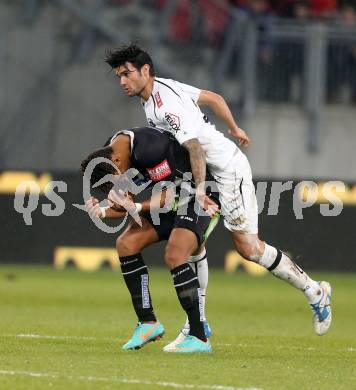 Fussball Bundesliga. RZ Pellets WAC gegen Sturm Graz. Solano,  (WAC),  Ruben Okotie (Sturm Graz). Klagenfurt, am 27.11.2012.
Foto: Kuess

---
pressefotos, pressefotografie, kuess, qs, qspictures, sport, bild, bilder, bilddatenbank