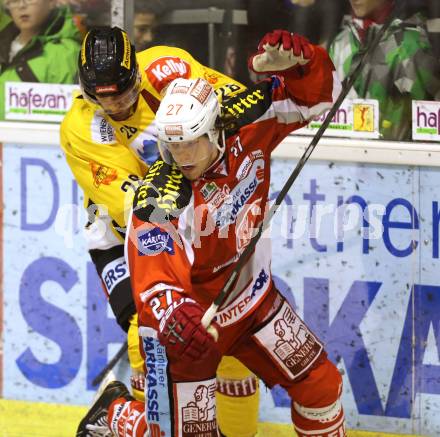 EBEL. Eishockey Bundesliga. EC KAC gegen UPC Vienna Capitals.  Thomas HUndertpfund,  (KAC), Dan Bjornlie (Vienna). Klagenfurt, am 2.12.2012.
Foto: Kuess 


---
pressefotos, pressefotografie, kuess, qs, qspictures, sport, bild, bilder, bilddatenbank