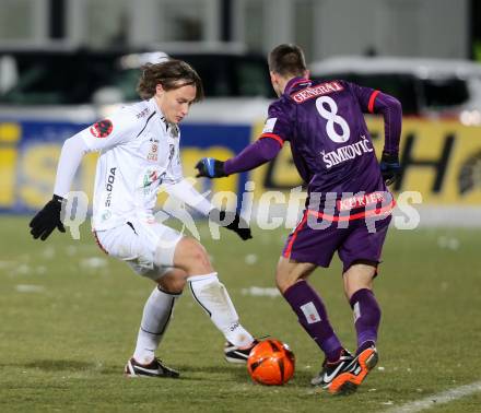 Fussball. Bundesliga. RZ Pellets WAC gegen FK Austria Wien. Dario Baldauf,  (WAC), Tomas Simkovic (Wien). Wolfsberg, 8.12.2012.
Foto: Kuess

---
pressefotos, pressefotografie, kuess, qs, qspictures, sport, bild, bilder, bilddatenbank