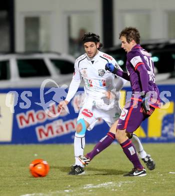 Fussball. Bundesliga. RZ Pellets WAC gegen FK Austria Wien. Michele Polverino,  (WAC), Fabian Koch (Wien). Wolfsberg, 8.12.2012.
Foto: Kuess

---
pressefotos, pressefotografie, kuess, qs, qspictures, sport, bild, bilder, bilddatenbank