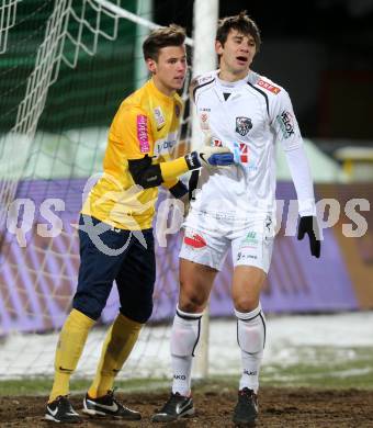 Fussball. Bundesliga. RZ Pellets WAC gegen FK Austria Wien. Mihret Topcagic,  (WAC), Heinz Lindner (Wien). Wolfsberg, 8.12.2012.
Foto: Kuess

---
pressefotos, pressefotografie, kuess, qs, qspictures, sport, bild, bilder, bilddatenbank