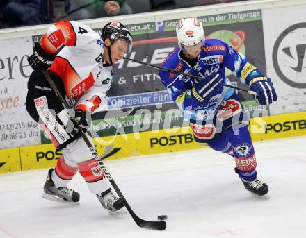 EBEL. Eishockey Bundesliga. EC VSV gegen HC TWK Innsbruck "Die Haie".  John Hughes, (VSV), Craig Switzer  (Innsbruck). Villach, am 21.12.2012.
Foto: Kuess 


---
pressefotos, pressefotografie, kuess, qs, qspictures, sport, bild, bilder, bilddatenbank