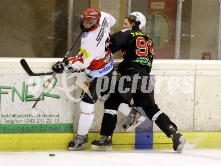 Eishockey CHL. Carinthian Hockey League. Tarco Woelfe gegen UEC Lienz. Nick Kompain, (Tarco), Michael Schneider (Lienz). Klagenfurt, am 22.12.2012.
Foto: Kuess
---
pressefotos, pressefotografie, kuess, qs, qspictures, sport, bild, bilder, bilddatenbank