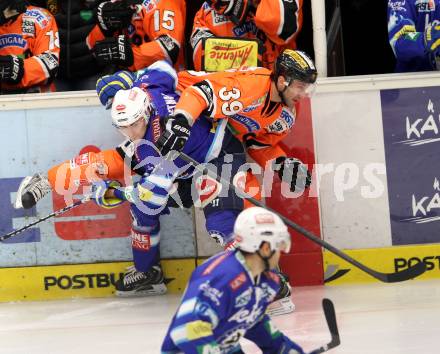 EBEL. Eishockey Bundesliga. EC VSV gegen Moser Medical Graz 99ers.  Klemen Pretnar, (VSV), FRISCHMON Trevor (Graz). Villach, am 23.12.2012.
Foto: Kuess 


---
pressefotos, pressefotografie, kuess, qs, qspictures, sport, bild, bilder, bilddatenbank