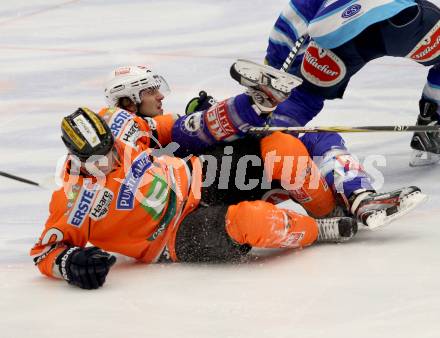 EBEL. Eishockey Bundesliga. EC VSV gegen Moser Medical Graz 99ers.  PETRIK Benjamin (VSV), NOVAK Jan (Graz). Villach, am 23.12.2012.
Foto: Kuess 


---
pressefotos, pressefotografie, kuess, qs, qspictures, sport, bild, bilder, bilddatenbank