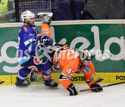 EBEL. Eishockey Bundesliga. EC VSV gegen Moser Medical Graz 99ers.  HUGHES John (VSV), LANNON Ryan (Graz). Villach, am 23.12.2012.
Foto: Kuess 


---
pressefotos, pressefotografie, kuess, qs, qspictures, sport, bild, bilder, bilddatenbank