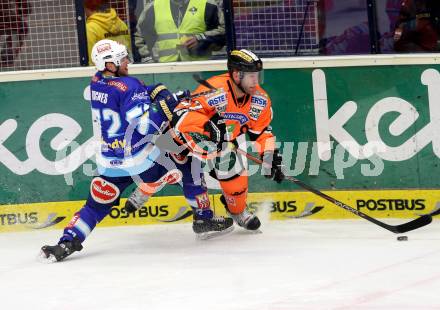 EBEL. Eishockey Bundesliga. EC VSV gegen Moser Medical Graz 99ers.  HUGHES John (VSV), LANNON Ryan (Graz).. Villach, am 23.12.2012.
Foto: Kuess 


---
pressefotos, pressefotografie, kuess, qs, qspictures, sport, bild, bilder, bilddatenbank