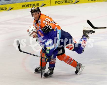 EBEL. Eishockey Bundesliga. EC VSV gegen Moser Medical Graz 99ers.  RYAN Derek (VSV), FRISCHMON Trevor (Graz). Villach, am 23.12.2012.
Foto: Kuess 


---
pressefotos, pressefotografie, kuess, qs, qspictures, sport, bild, bilder, bilddatenbank