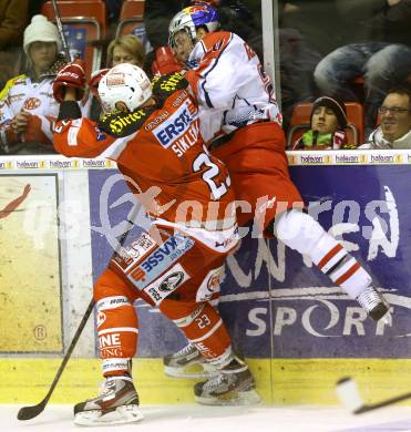 EBEL. Eishockey Bundesliga. EC KAC gegen EC Red Bull Salzburg.  Mike Siklenka,  (KAC), Daniel Welser (Salzburg). Klagenfurt, am 26.12.2012.
Foto: Kuess 


---
pressefotos, pressefotografie, kuess, qs, qspictures, sport, bild, bilder, bilddatenbank