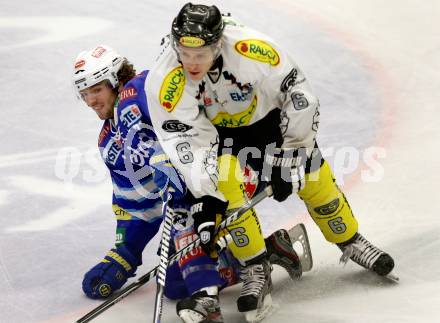 EBEL. Eishockey Bundesliga. EC VSV gegen Dornbirner Eishockey Club.  Benjamin Petrik,  (VSV), Jonathan D Aversa (Dornbirn). Villach, am 28.12.2012.
Foto: Kuess 


---
pressefotos, pressefotografie, kuess, qs, qspictures, sport, bild, bilder, bilddatenbank