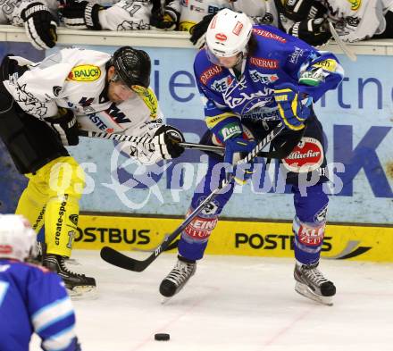 EBEL. Eishockey Bundesliga. EC VSV gegen Dornbirner Eishockey Club.  Benjamin Petrik,  (VSV), Robert Logan MacMillan (Dornbirn). Villach, am 28.12.2012.
Foto: Kuess 


---
pressefotos, pressefotografie, kuess, qs, qspictures, sport, bild, bilder, bilddatenbank