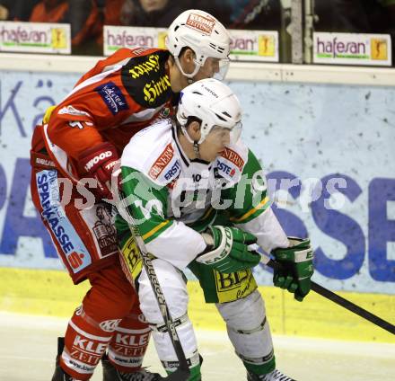 EBEL. Eishockey Bundesliga. EC KAC gegen HDD TELEMACH Olimpija Ljubljana. Florian Iberer,   (KAC), Brock McBride (Laibach). Klagenfurt, am 1.1.2013.
Foto: Kuess 


---
pressefotos, pressefotografie, kuess, qs, qspictures, sport, bild, bilder, bilddatenbank