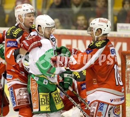 EBEL. Eishockey Bundesliga. EC KAC gegen HDD TELEMACH Olimpija Ljubljana. Thomas Koch, Mike Siklenka,  (KAC),  Kevin De Vergilio (Laibach). Klagenfurt, am 1.1.2013.
Foto: Kuess 


---
pressefotos, pressefotografie, kuess, qs, qspictures, sport, bild, bilder, bilddatenbank