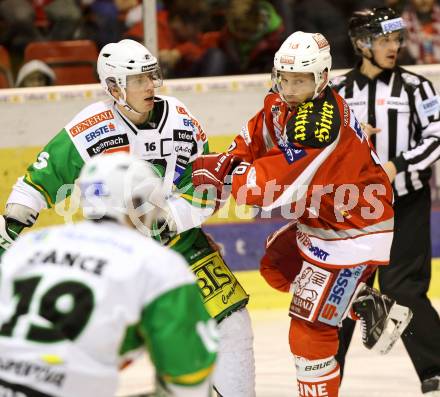 EBEL. Eishockey Bundesliga. EC KAC gegen HDD TELEMACH Olimpija Ljubljana.  Thomas Koch, (KAC), Ales Music  (Laibach). Klagenfurt, am 1.1.2013.
Foto: Kuess 


---
pressefotos, pressefotografie, kuess, qs, qspictures, sport, bild, bilder, bilddatenbank