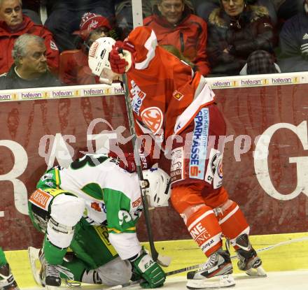 EBEL. Eishockey Bundesliga. EC KAC gegen HDD TELEMACH Olimpija Ljubljana. Jamie Lundmark, (KAC),  Miha Pesjak  (Laibach). Klagenfurt, am 1.1.2013.
Foto: Kuess 


---
pressefotos, pressefotografie, kuess, qs, qspictures, sport, bild, bilder, bilddatenbank